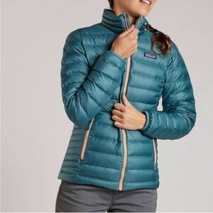 Patagonia Teal Jacket with Orange Accents. Size L